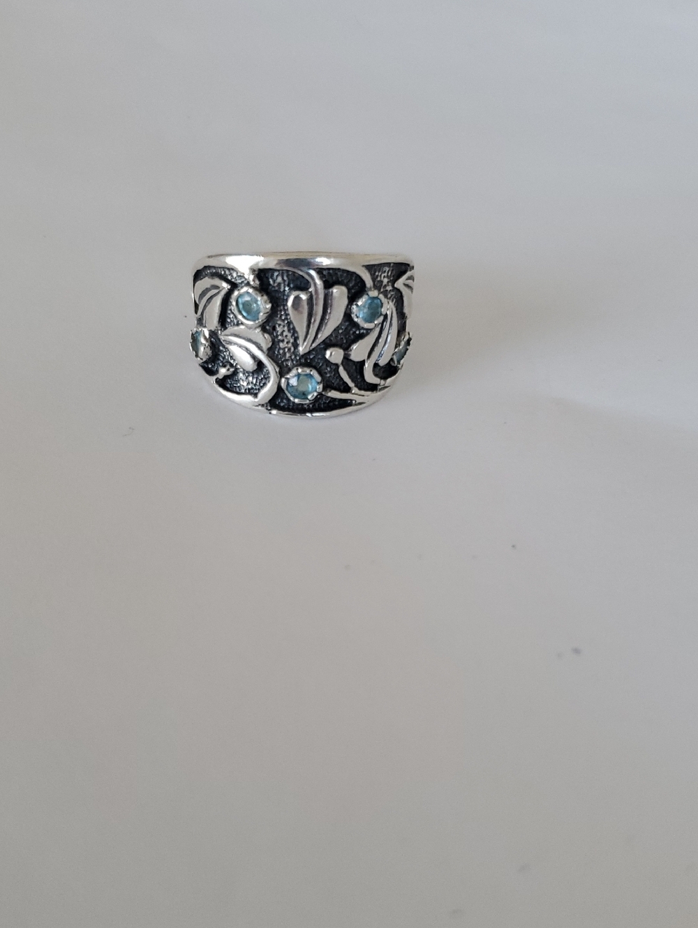 Sterling Silver 925 Ring with Bezel Set Blue Topaz Stones in a Size 8